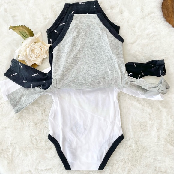 NWT NIKE 3PK LOGO BODYSUITS (onesies) with logo & “JUST DO IT” Blk, grey, white - Picture 4 of 5